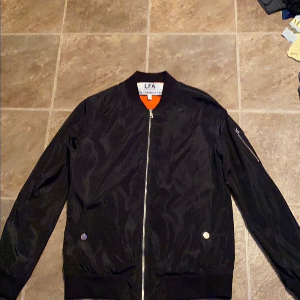 black with orange inside jacket